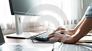 Software developer or programmer working data debugging improvement binary algorithm on desktop pc in a software develop company