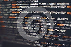 Software developer programming code. Abstract computer script code. Selective focus