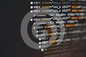 Software developer programming code. Abstract computer script code. Selective focus