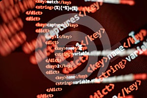 Software developer programming code. Abstract computer script code. Selective focus