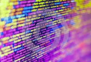 Software developer programming code on black screen. Big data storage and cloud computing representation. Writing program code on