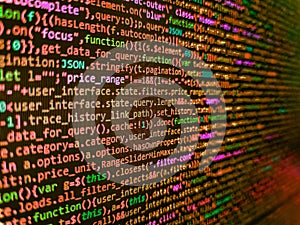 Software developer programming code on black screen. Modern web development background. Software engineer at work. Screen of web