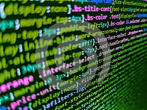 Software developer programming code on black screen. Developer working on websites codes in office. Css3 code on a colorful