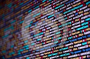 Software developer programming code on computer. Abstract computer script source code