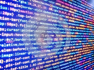 Software developer programming code on computer. Digital technology on display. Big data concepts working in cyberspace