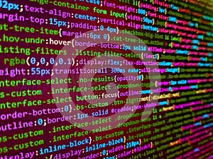 Software developer programming code on computer. Matrix byte of binary data rian code running abstract background in dark blue