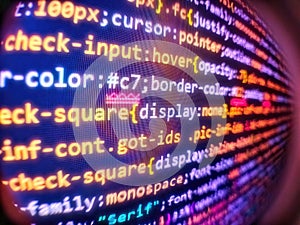 Software developer programming code on computer monitor. Digital abstract bits data stream, cyber pattern digital background.