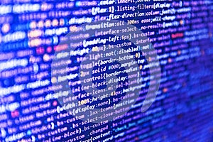 Software developer programming code on computer monitor. Script on computer with source code. Modern application Source abstract
