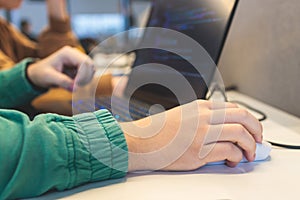Software developer students in auditorium hall working on computer and laptop, programming contest hackathon competition, pc with