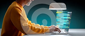 Software developer typing on illuminated keyboard with code on screen in modern workspace