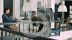 Software developer typing programming code on computer keyboard