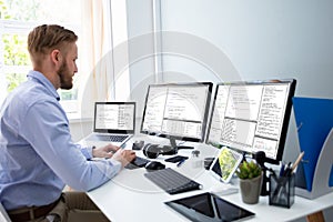 Software developer working in office