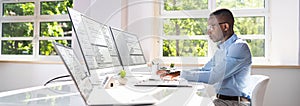 Software developer working in office