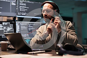Software developer writing source code