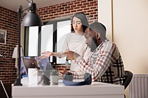 Software developers using coding terminal window