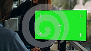 Software developers working on code programming with greenscreen