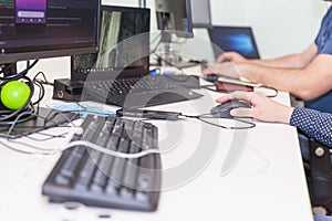 Software developer, coder or programmer working on computer