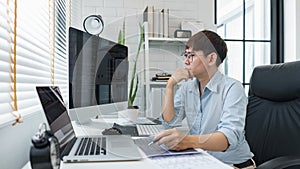 Software development concept, Male programmer read data code to thinking about developing website