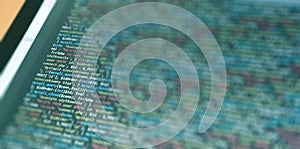 Software development monitor screen background. Developer display with source code. Programming concept