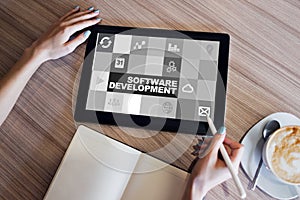Software development and process automation concept on tablet computer screen.