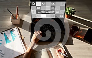 Software development and process automation concept on tablet computer screen.