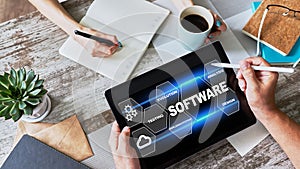 Software development and process automation concept on tablet computer screen.