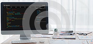 Software development programming on computer screen for brisk application