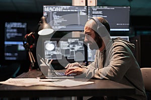 Software engineer typing code and creating algorithm