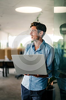 Software engineer using laptop computer with global network connection, Technology, innovation