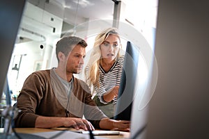 Software engineers working on project and programming in company. Startup business group concept