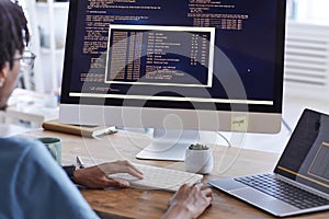 Software Programmer Writing Code