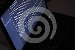 Software source code. Program code. Code on a computer screen. The developer is working on program codes in the office.