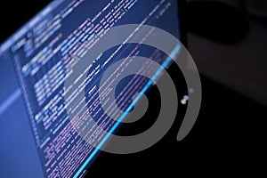 Software source code. Program code. Code on a computer screen. The developer is working on program codes in the office.