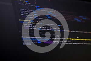 Software source code. Program code. Code on a computer screen. The developer is working on program codes in the office.