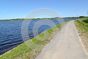 Sogi River Embankment in summer day. Poshekhonje, Yaroslavl region