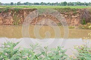 Soil erosion due to water erosion.