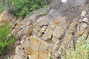 Soil erosion after heavy rain on a hillside