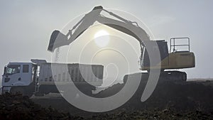 Soil loading and working moment of the large -tracked construction machine on the truck