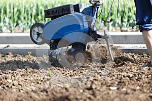 Soil loosening and weed removal with a cultivator