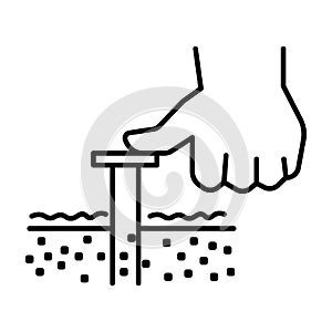 Soil sampler testing tool and hand linear icon