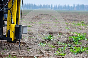 Soil Sampling - automated probe for soil samples taking sample with soil probe sampler. Precision agricultural technology
