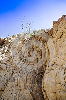 Soil or stone section under condition of the erosion