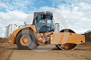 Soil vibration compactor at work