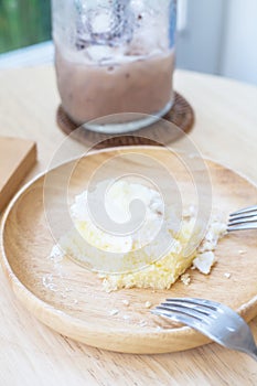 Soiled cake plate on wood