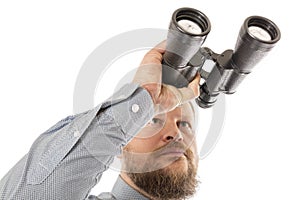 Soilid bearded man in shirt with binoculars