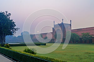 Soiuth gate to Taj Mahal in the fog in the early morning