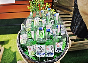 Soju display on basket shelf in store, Korean alcoholic drinks, Korean liquor in an Asian supermarket