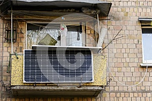 The solar battery panel mounted on the balcony of an apartment building in Kyiv, Ukraine. March 2020