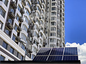 The solar battery panel mounted near modern apartment building in Kyiv, Ukraine