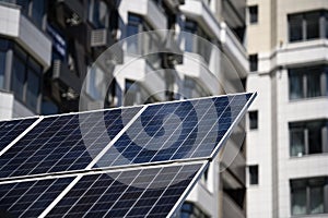 The solar battery panel mounted near modern apartment building in Kyiv, Ukraine